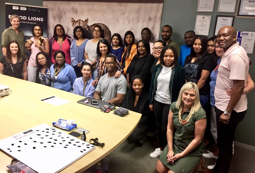 A few of the Thompsons Africa team members after 1 of 3 Blood Lions screenings that day.jpg