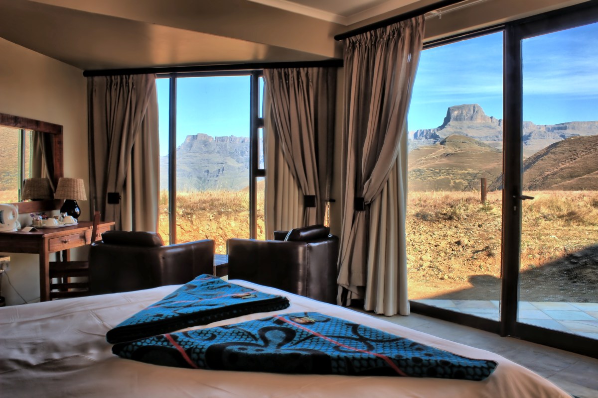 Winter view of the Drakensberg's Ampitheatre from the bed.JPG